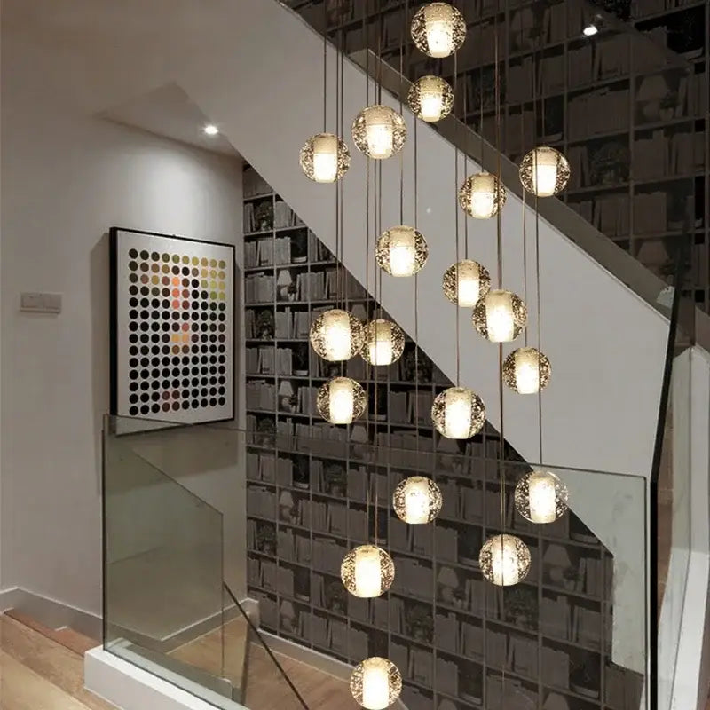 A modern cascading pendant light with multiple spherical glass globes decorbites crystal ball led for living room decor
