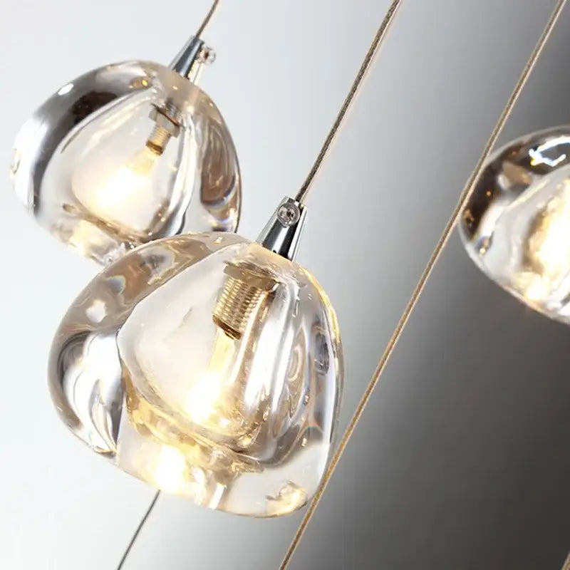 Clear teardrop glass pendant lights with exposed filaments and chrome fixtures in modern decorbites crystal ball chandelier