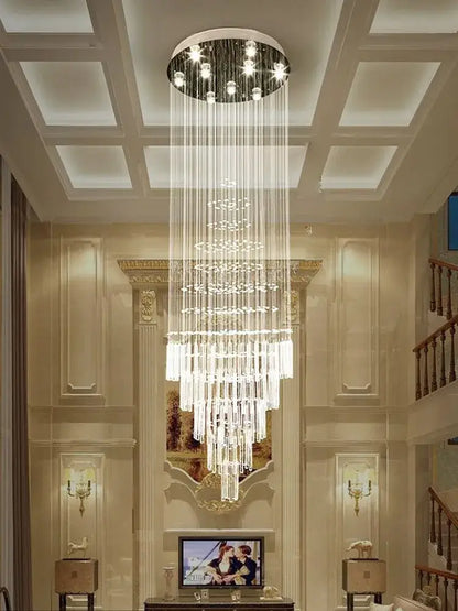 A modern multi-tiered decorbites crystal chandelier with clear glass prisms for living room decor