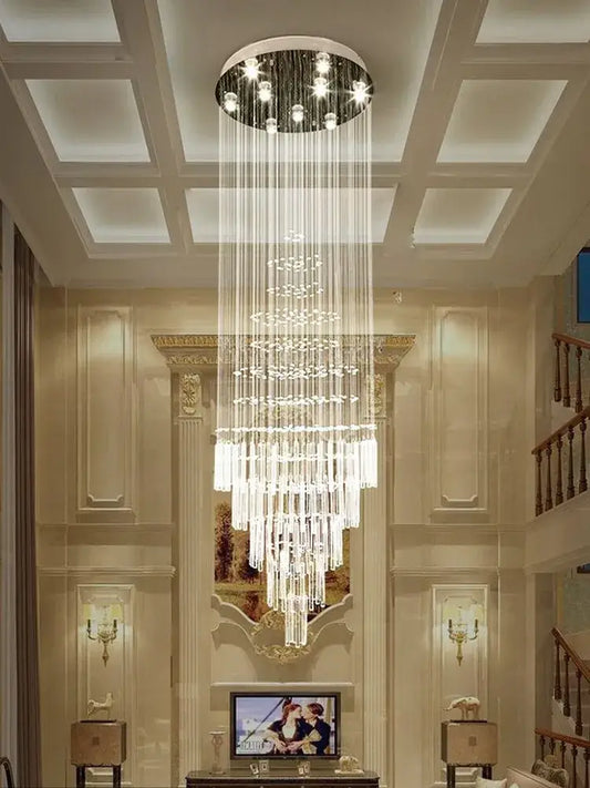 A modern multi-tiered decorbites crystal chandelier with clear glass prisms for living room decor