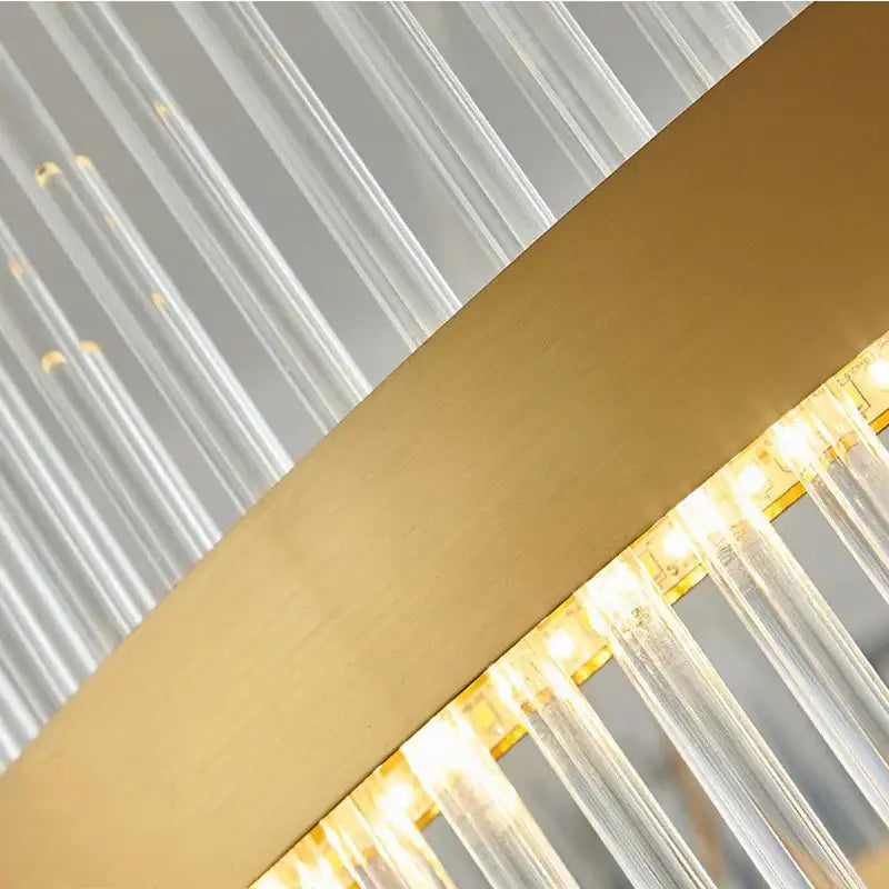 Modern cascading gold crystal pendant chandelier with clear prisms and warm led lights for elegant dining room decorbites crystal pendant