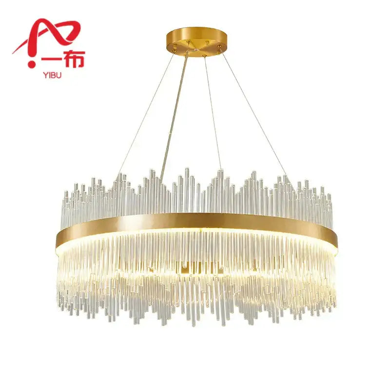 Modern cascading gold crystal pendant chandelier featuring clear glass rods for elegant dining room decorbites crystal pendant