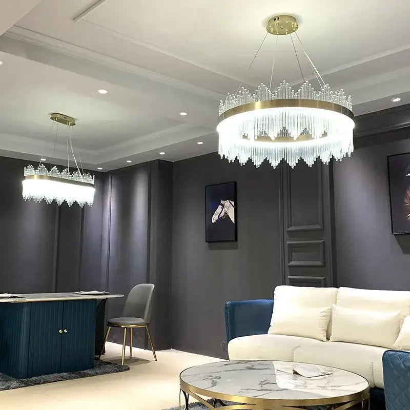 A modern circular gold crystal pendant chandelier with cascading clear prisms for dining room decorbites crystal pendant