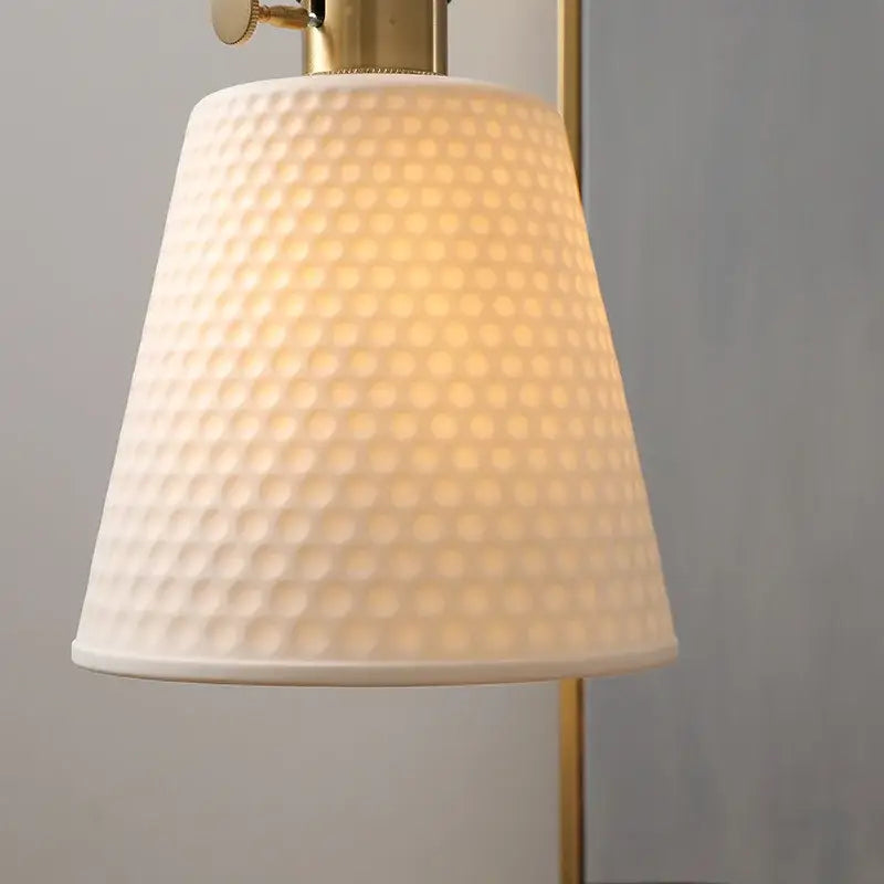 Modern ceramic led pendant light with cream-colored hammered glass lampshade and brass-finished metal fixture for dining room decorbites ceramic led