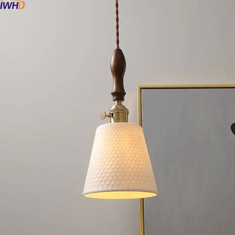 Modern ceramic led pendant light with off-white textured fabric shade, brass hardware, and dark wood handle for dining room decorbites ceramic led pendant