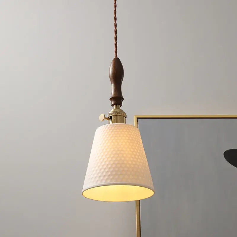 Modern ceramic led pendant light with off-white fabric shade, brass accents, and dark wood finish for dining room decorbites ceramic led pendant