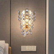 Modern champagne hexagon crystal wall sconce with clear faceted crystals in a metallic frame for e12 led incandescent fluorescent bulbs