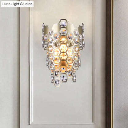 Modern champagne hexagon crystal wall sconce with cascading amber and clear crystals in a sleek metallic frame e12 light