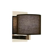 Modern charcoal fabric drum wall sconce with textured shade and chrome metal base for white black bedroom lighting