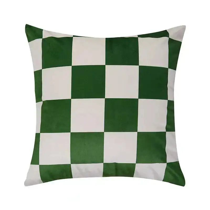 Square cushion cover with bold green and white checkerboard pattern made of decorbites fluffy velvet for bedroom decor