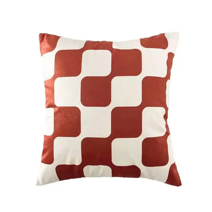A modern checkered cushion cover with bold red and cream geometric pattern in decorbites fluffy velvet fabric