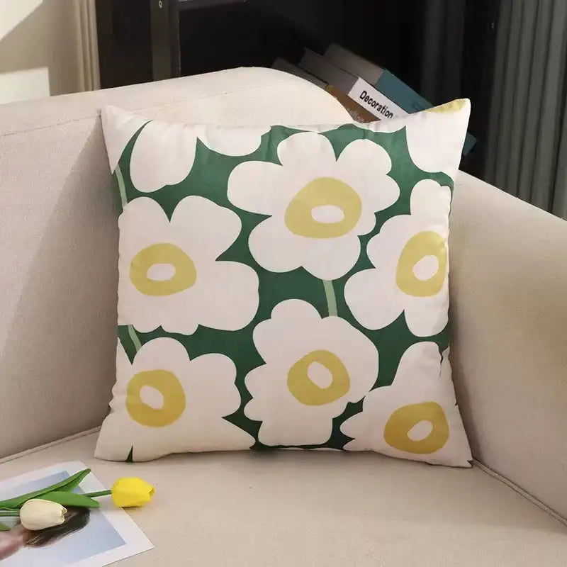 Modern checkered fluffy velvet cushion cover with white flowers and yellow centers on deep green decorbites fluffy velvet pillow
