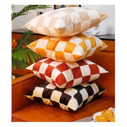 Stacked modern checkered fluffy velvet cushion covers in cream beige orange white red and black for bedroom decorbites decor