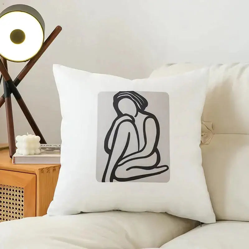 White square cushion cover with minimalist black line seated figure on fluffy velvet pillow for bedroom decorbites decor