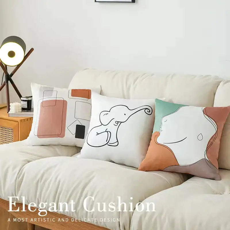 White modern checkered fluffy velvet cushion cover with minimalist black elephant line drawing and soft peach teal decorbites fluffy velvet pillow design