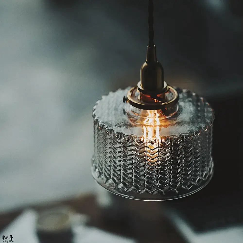 Modern chevron clear glass led pendant light with textured zigzag pattern and brass-toned decorbites clear glass fixture