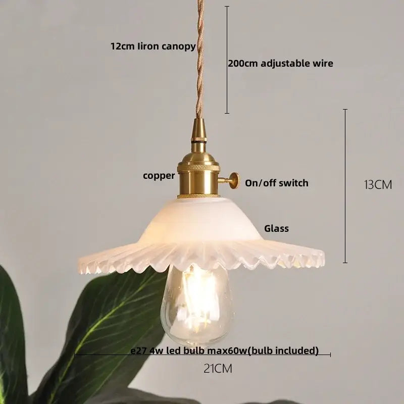Modern pendant light with brass copper fixture frosted scalloped glass shade and exposed Edison bulb clear glass led decorbites