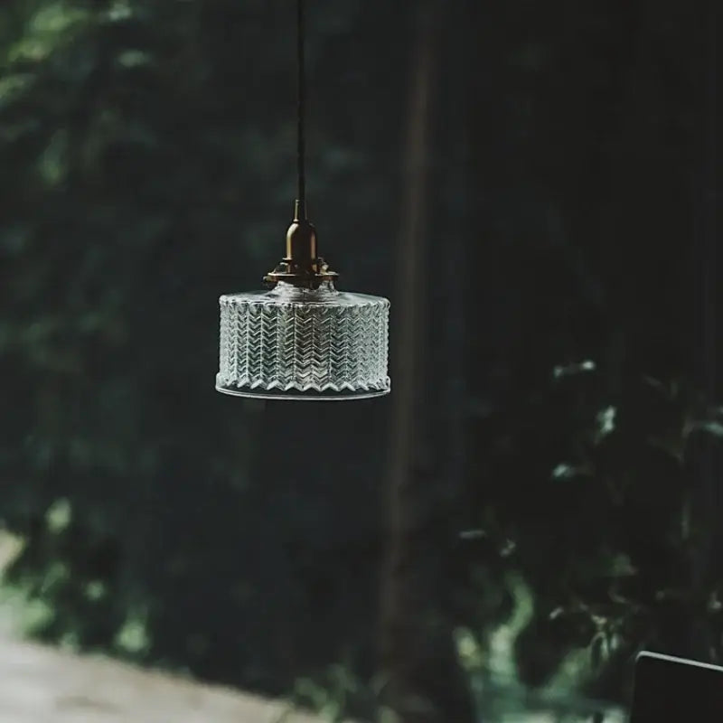 Modern chevron clear glass led pendant light with textured ribbed design and brass hardware by decorbites pendant light