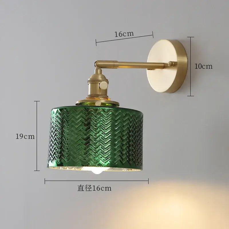 Modern chevron green glass led wall light with zigzag pattern mounted on brass arm for bedroom use with pull chain switch