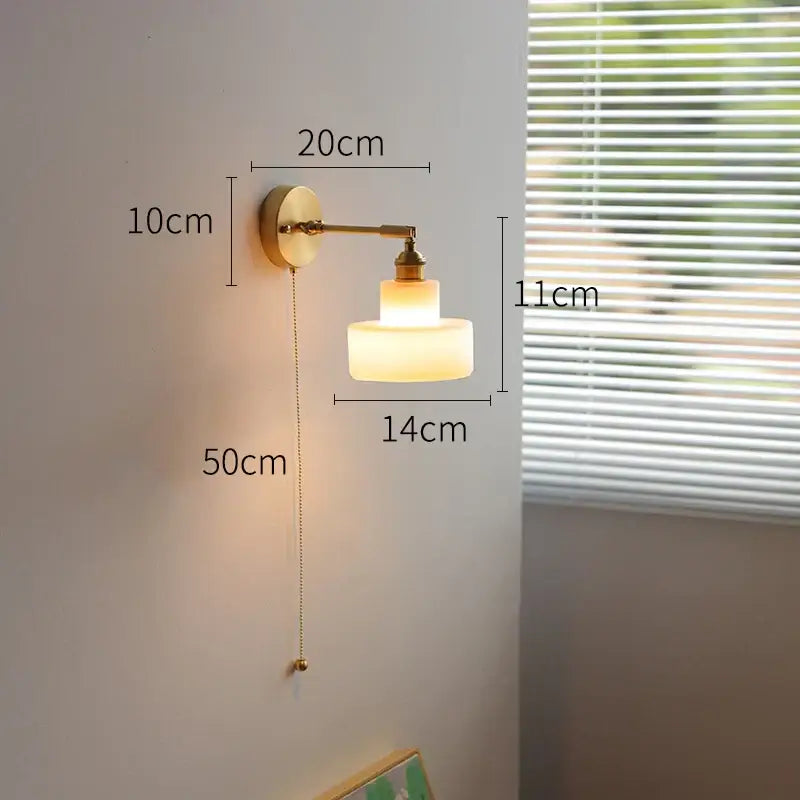 Modern chevron green glass led wall light with warm frosted glass, brass arm, and pull chain switch for bedroom use