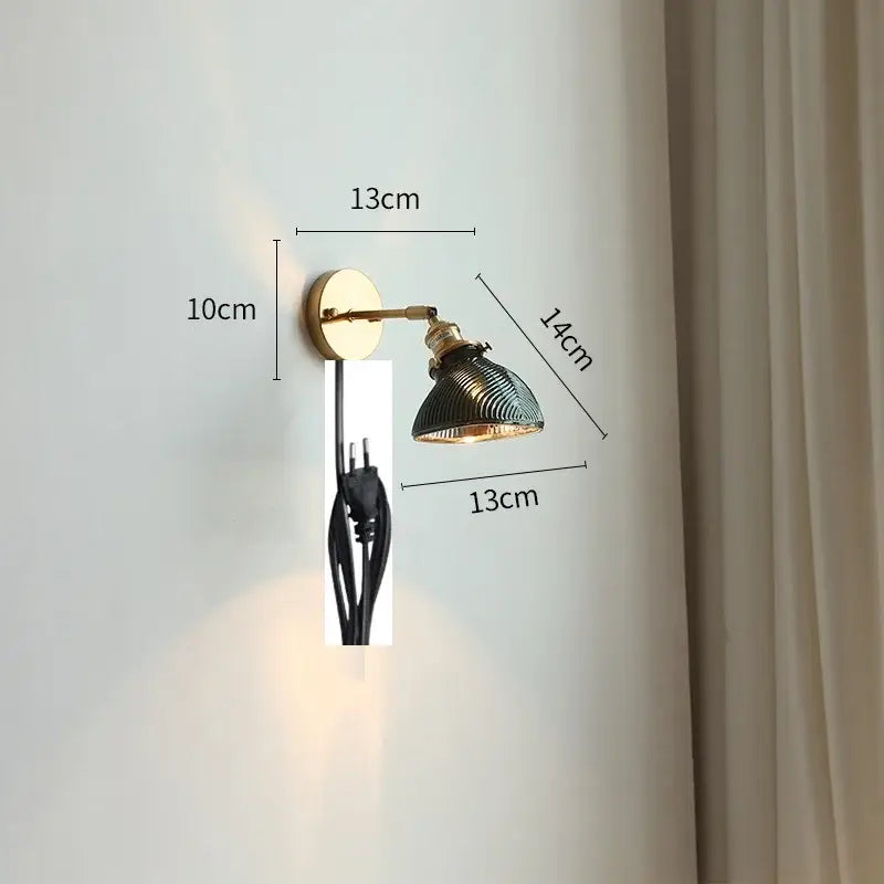 Modern chevron green glass led wall light with brass mounting and articulated arm featuring ribbed shade and pull chain switch