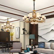Modern chinese gold copper jade chandelier with frosted glass shades and crystal accents for living room lighting