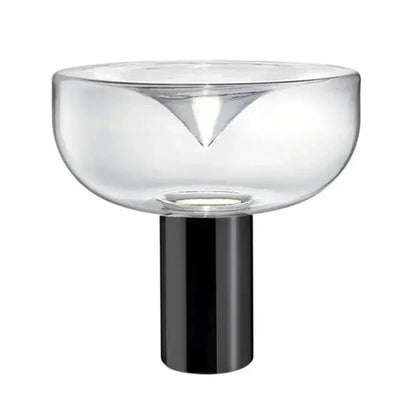 Modern chrome aella glass table lamp with clear glass and sleek black base featuring triangular cutout decorbites aella glass