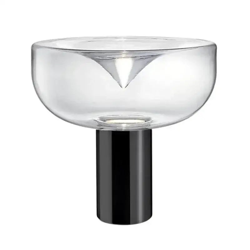 Modern chrome aella glass table lamp with clear glass and sleek black base featuring triangular cutout decorbites aella glass
