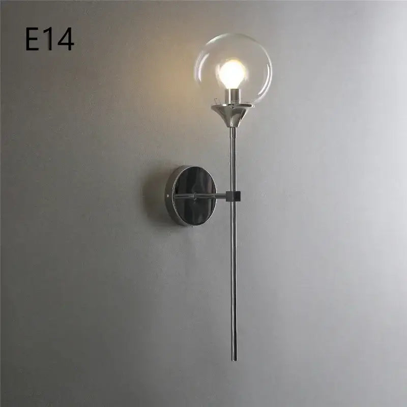 Modern chrome wall lamps with amber decorbites glass ball and clear globe bulb for stylish living room lighting