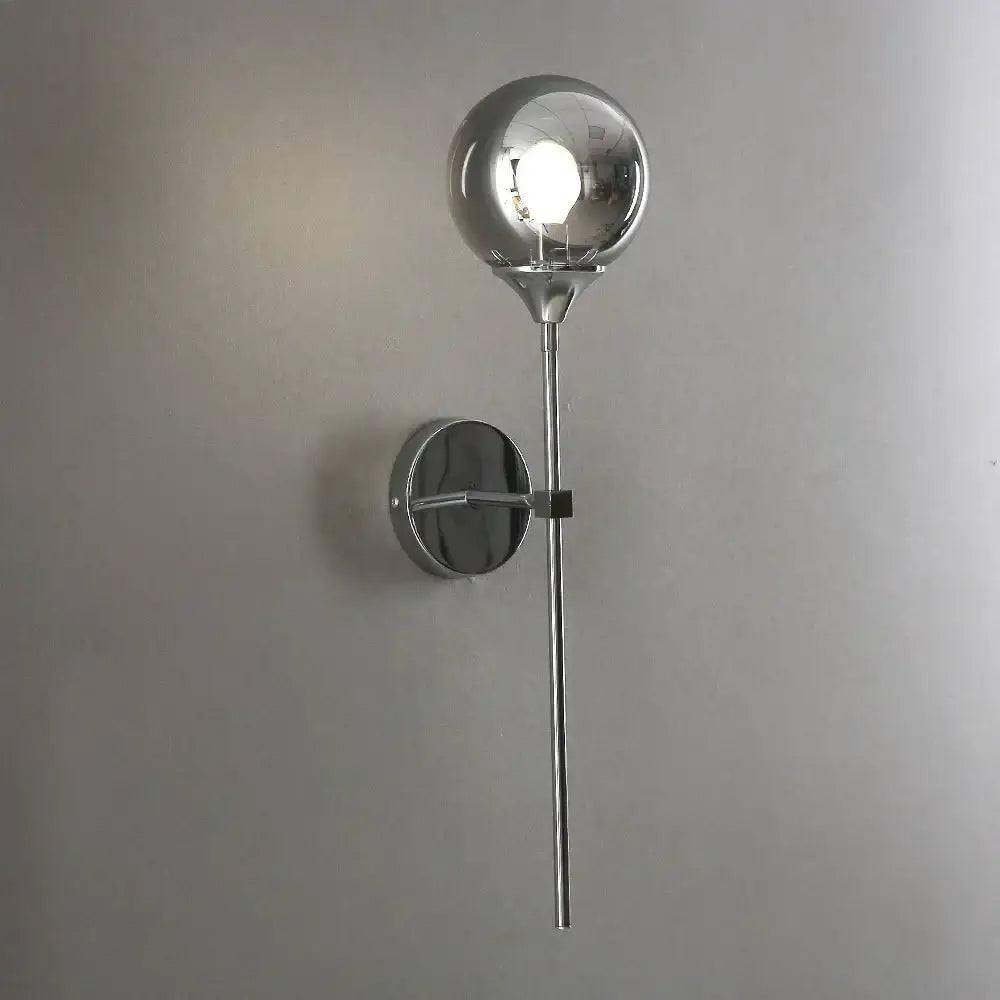 Modern chrome and amber glass ball wall lamps featuring a chrome-finished spherical glass ball decorbites glass ball design