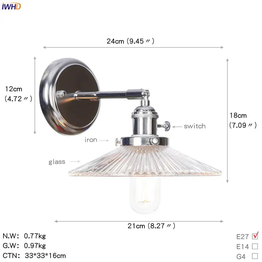 Modern chrome wall light with amber glass ball shade and exposed edison bulb for bedroom sconce lighting