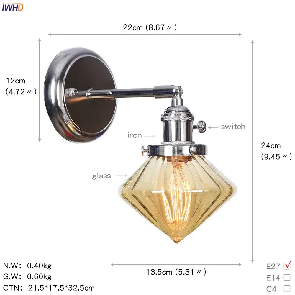 Modern chrome and amber glass ball wall light with faceted amber glass shade and exposed edison bulb bedroom sconce