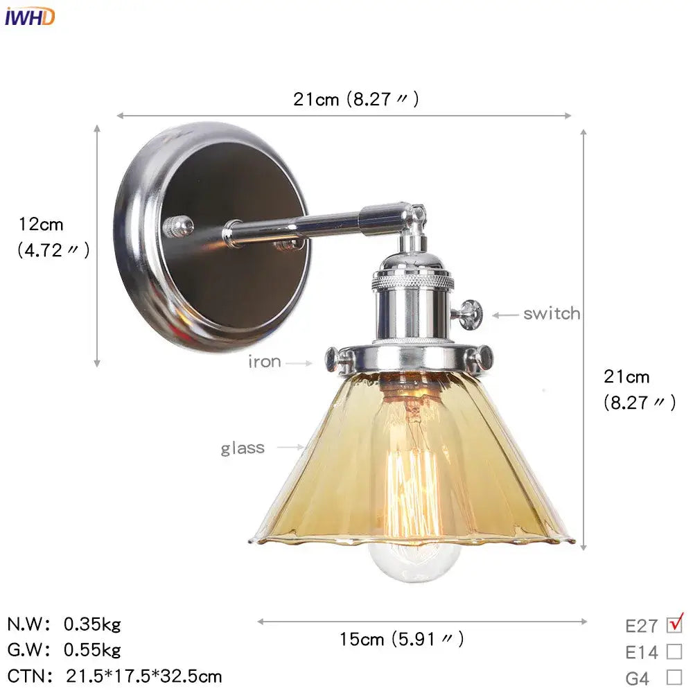 Modern chrome wall light with amber glass ball shade and exposed Edison bulb for bedroom sconce lighting