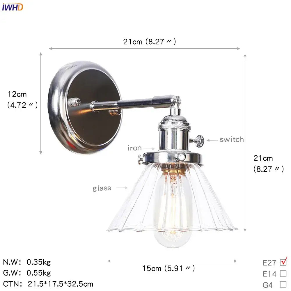 Modern chrome wall light with amber glass ball and fluted glass shade featuring exposed edison bulb bedroom sconce