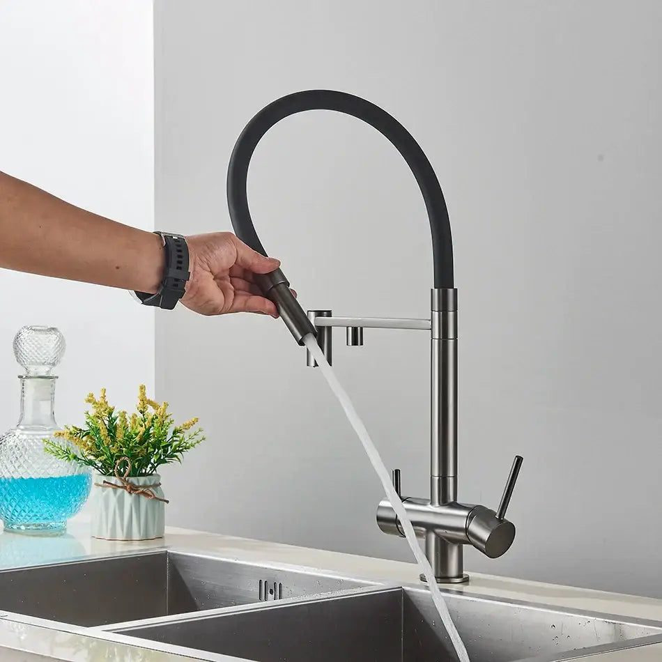 Modern chrome and black dual spout water filter faucet with a sleek curved pull-out stainless steel spout for kitchen use
