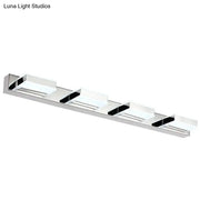 Modern chrome and black geometric wall light with rectangular white diffusers and nickel finish for bathroom use