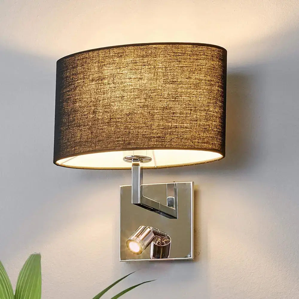 Modern chrome and brown fabric wall sconce with textured shade metal fixture and adjustable spotlight for bedroom use