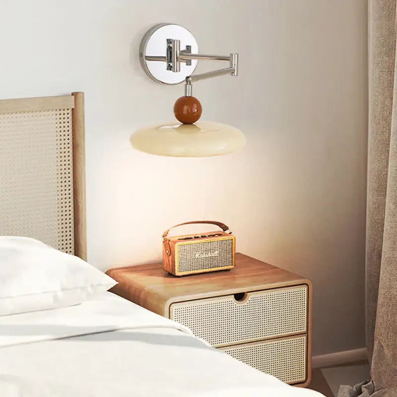 Modern chrome and ceramic iron wall light with cream ceramic shade and polished brass accent for bedroom decorbites iron wall use