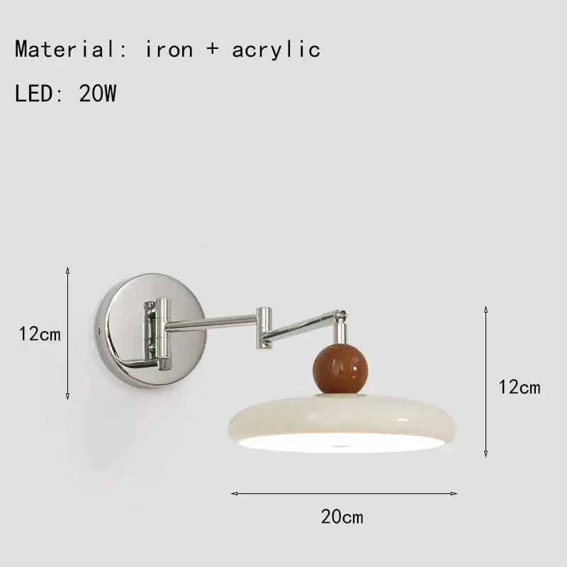 Modern chrome and ceramic iron wall light with adjustable arm, acrylic shade, and warm brown decorbites iron wall detail