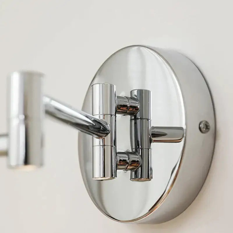 Modern chrome and ceramic iron wall light with adjustable articulated arm and dual-sided magnifying mirror for decorbites iron wall light