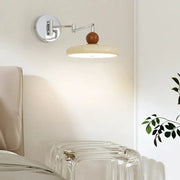 Modern chrome and ceramic iron wall light with adjustable polished chrome arm and warm ceramic sphere shade for bedroom decor
