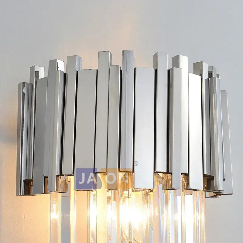 Modern chrome and gold decorbites crystal clear led wall sconce with vertical bars and hanging crystal prisms for bedroom