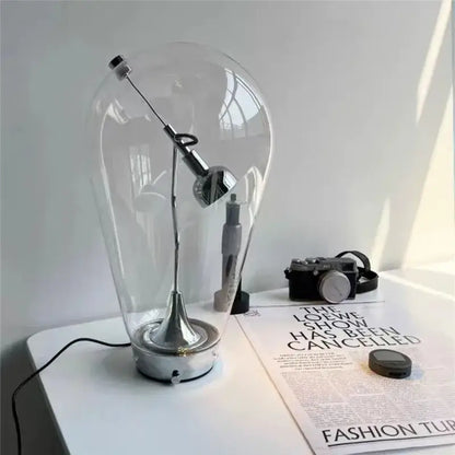 Modern chrome and transparent blow glass table lamp with chrome finish adjustable arm for living room decorbites lodes blow