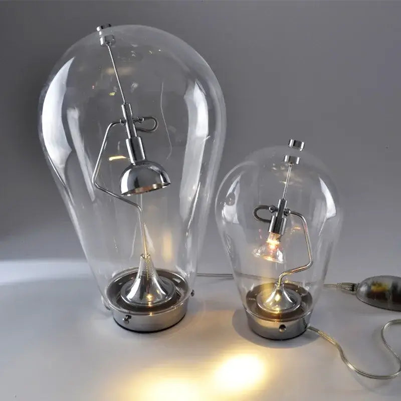 Modern chrome and transparent blow glass table lamp with adjustable arms and chrome base for living room decorbites lodes blow
