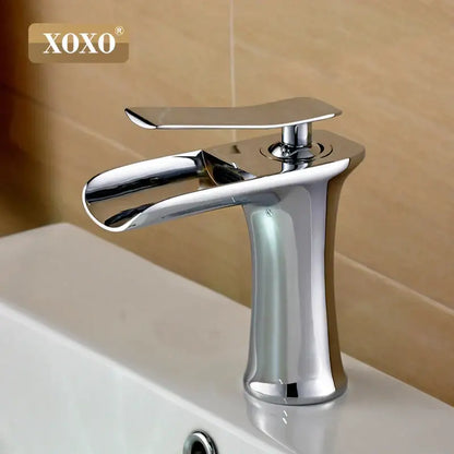 Modern chrome and white copper waterfall vanity faucet by xoxo with sleek curved spout and flat handle for copper waterfall vanity decorbites