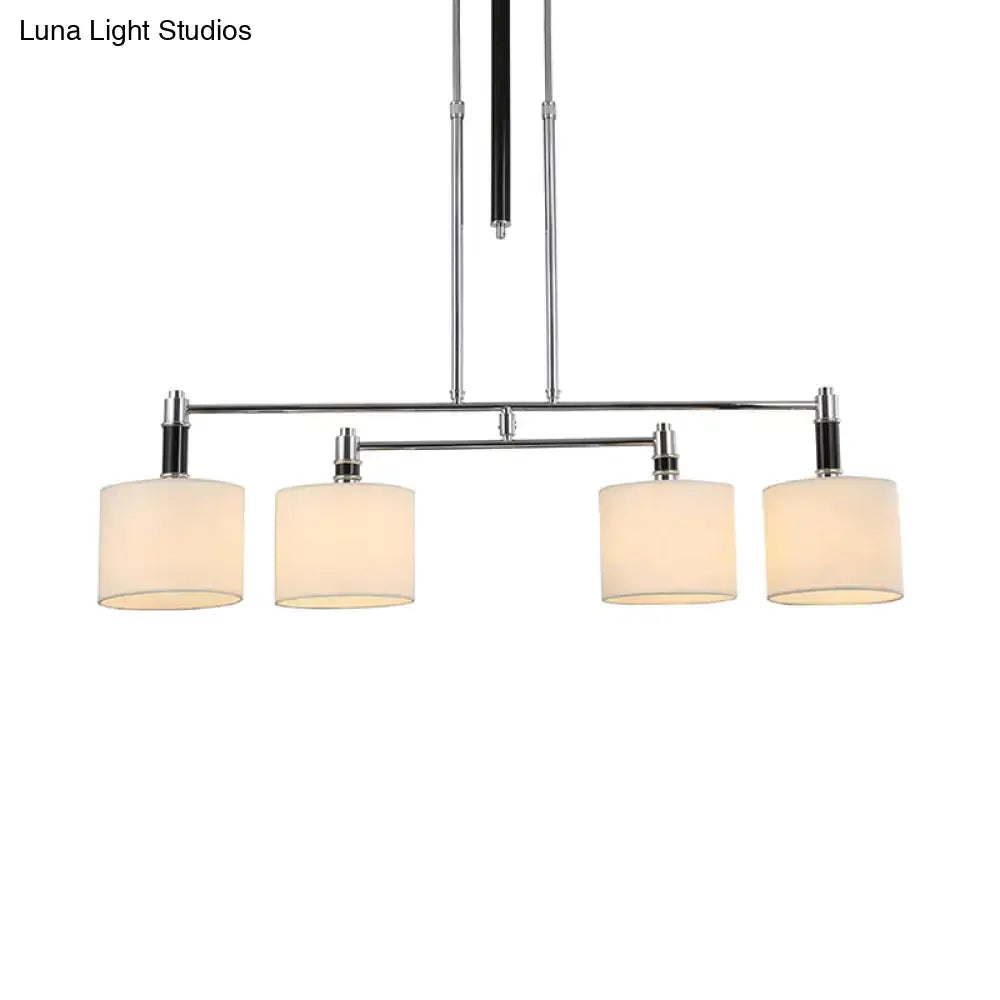 Modern chrome and white fabric pendant light kit with four cylindrical off-white shades compatible with e12 bulbs