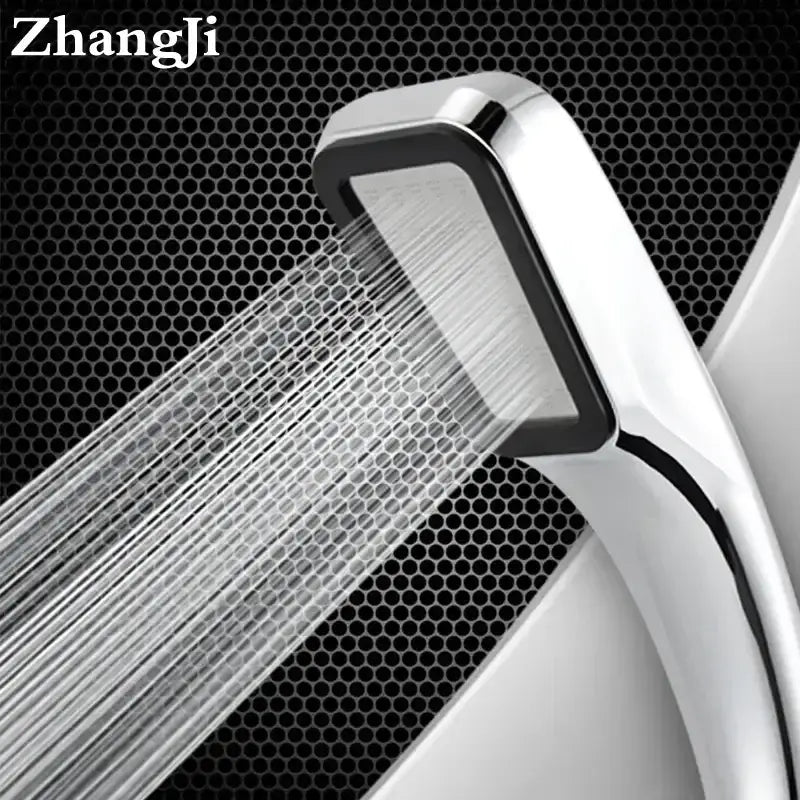 A sleek modern chrome and black handheld shower head with 300 holes for a high pressure shower experience