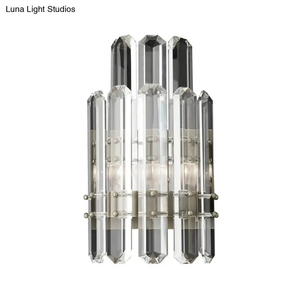 Modern chrome and black crystal wall sconce with clear and dark gray faceted columns direct wired electric power source