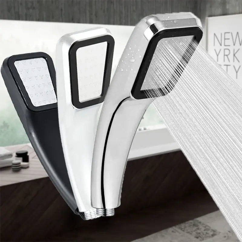 Modern chrome and black rainfall shower head handheld with sleek rectangular spray nozzles and chrome finish