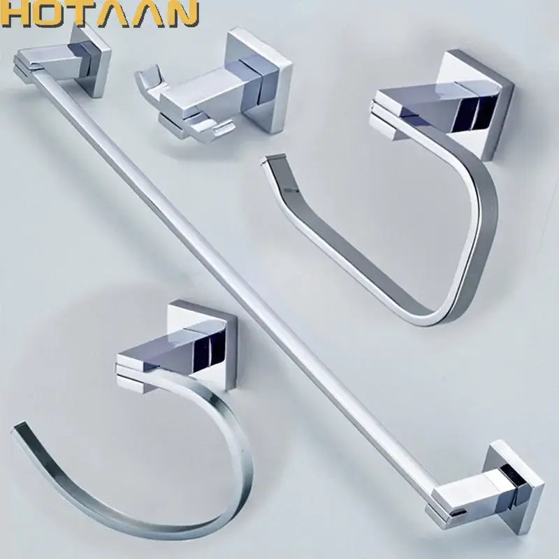 Modern chrome and blue stainless steel bathroom accessories set with sleek angular towel rack and square wall mounts